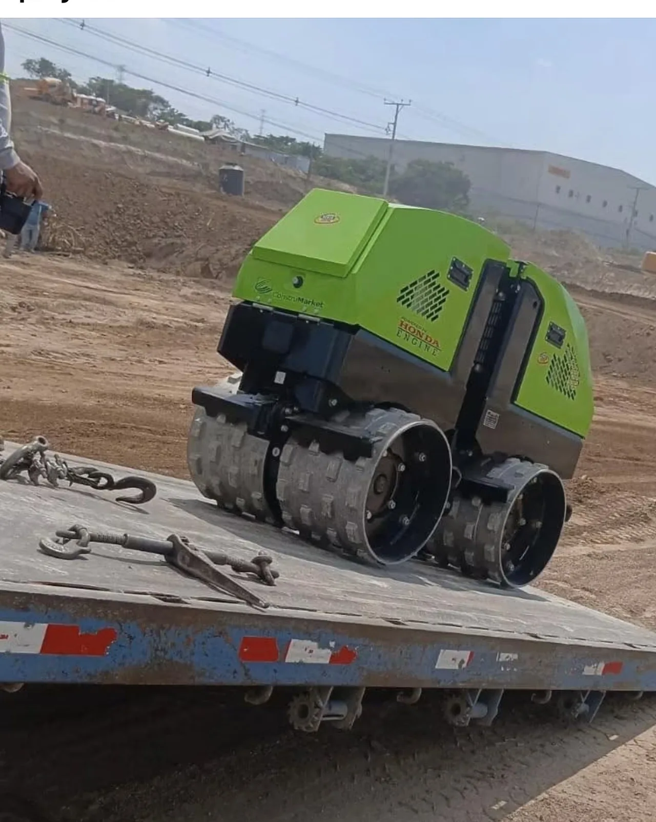 SIMAQ padfoot roller heading to a project